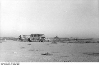 Imagine atasata: Bundesarchiv_Bild_101I-439-1276-05,_Nordafrika,_Zugkraftwagen_mit_Flak.jpg